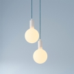 2-light multi-pendant lamp featuring fabric cable and metal finishes